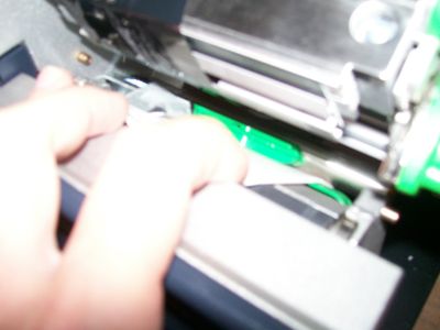 Tubing feed with media sensor (white chalk line should in center of tubing